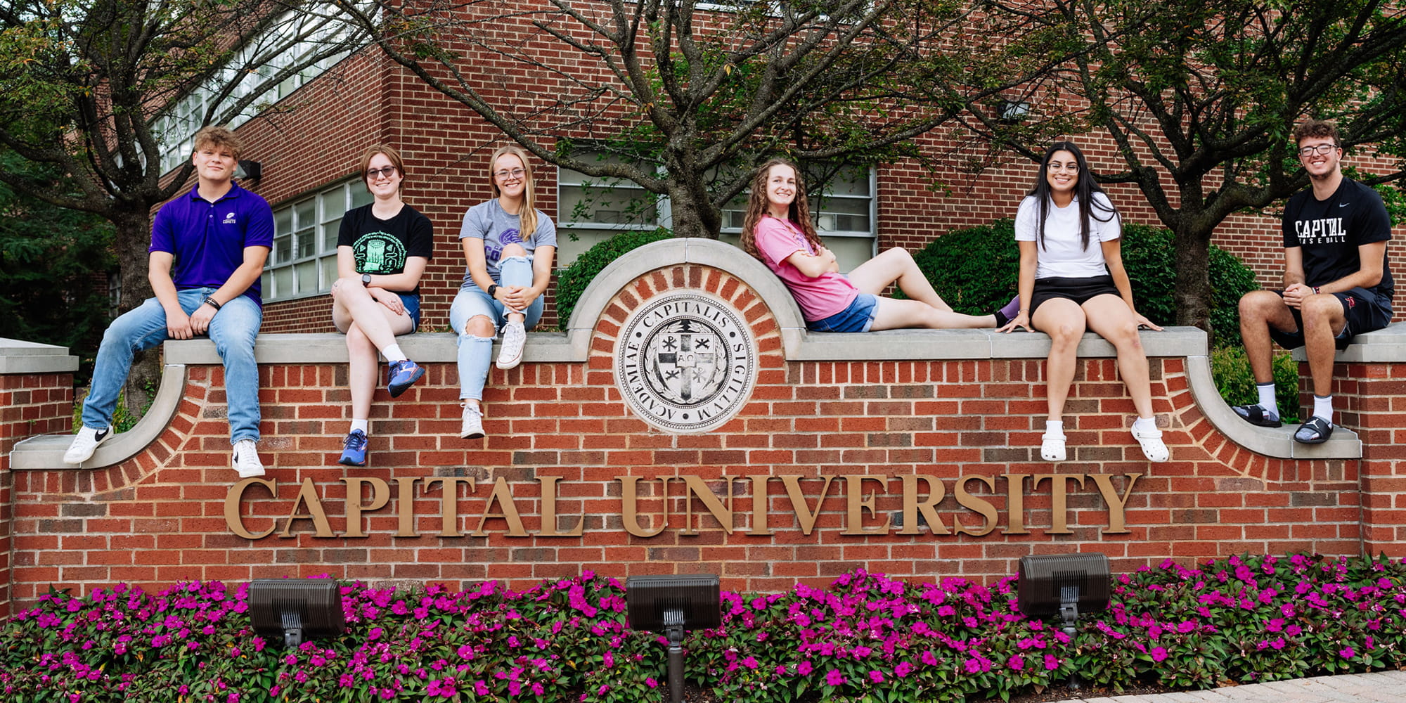 Students On Capital Sign