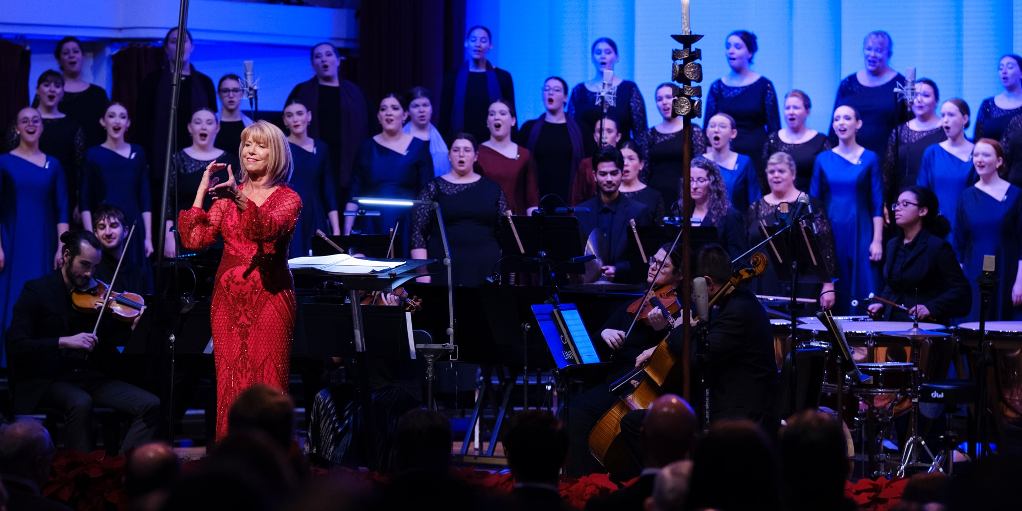 Director Lynda Hasseler and the Chapel Choir on stage