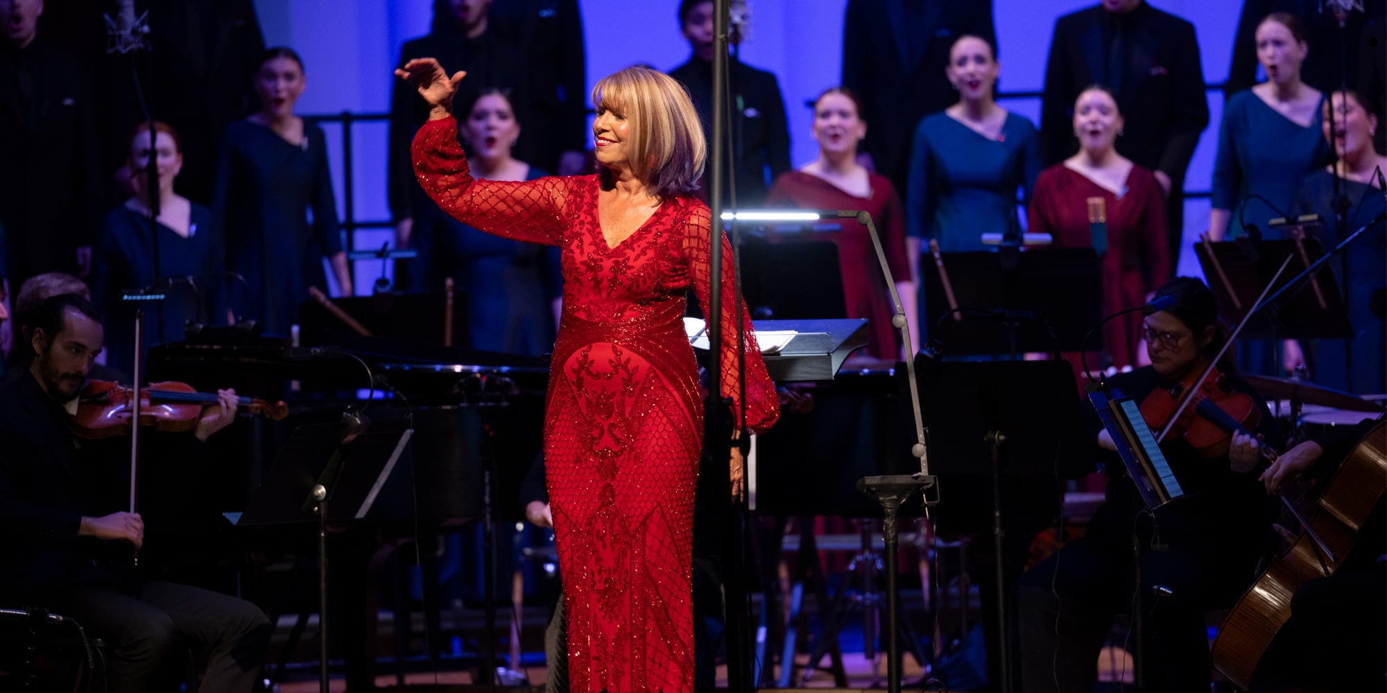 The chapel choir performs, led by director Lynda Hasseler