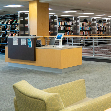 Blackmore Library shelves and information desk