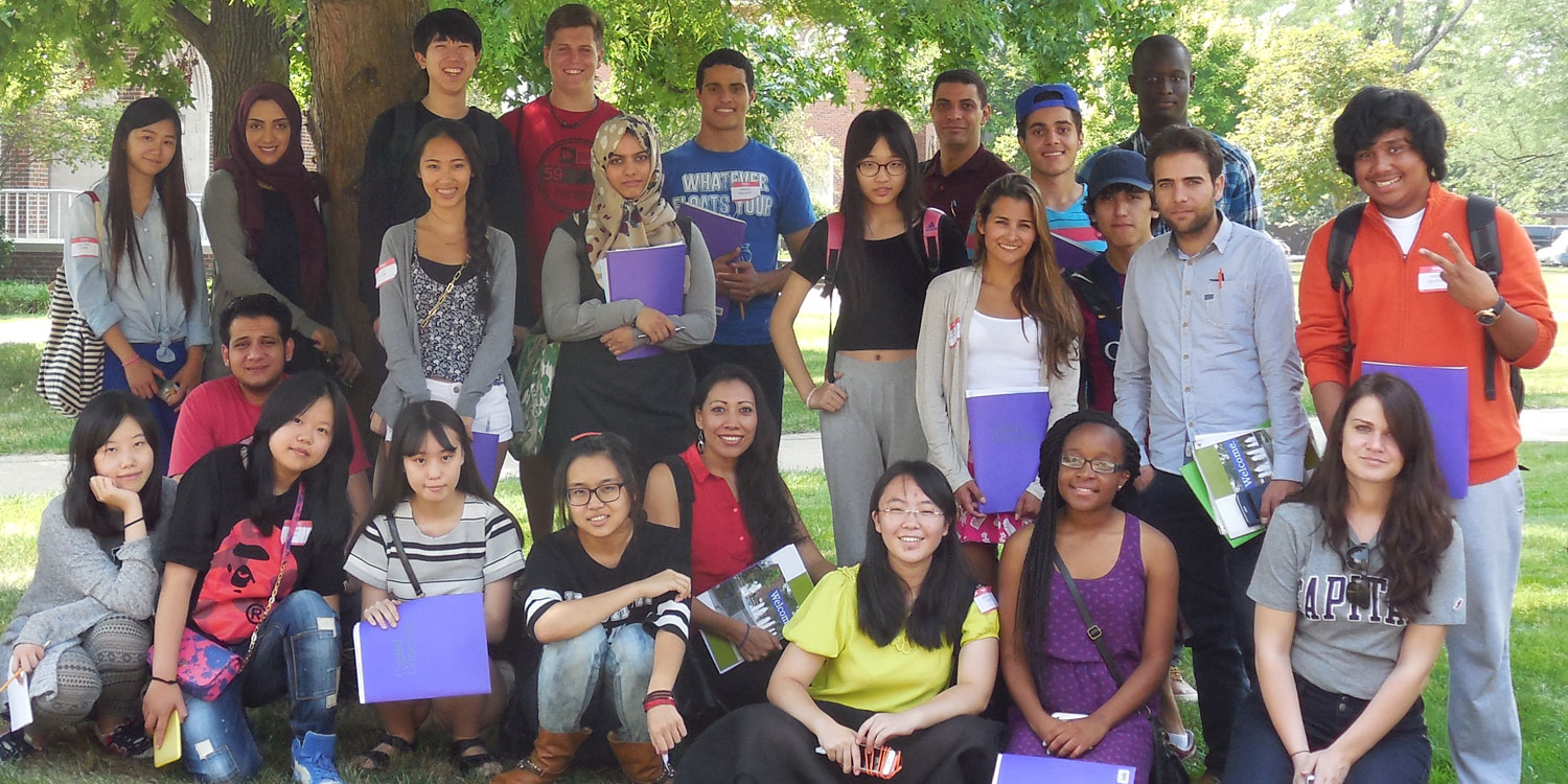 Group photo outside with students of different ethnicities