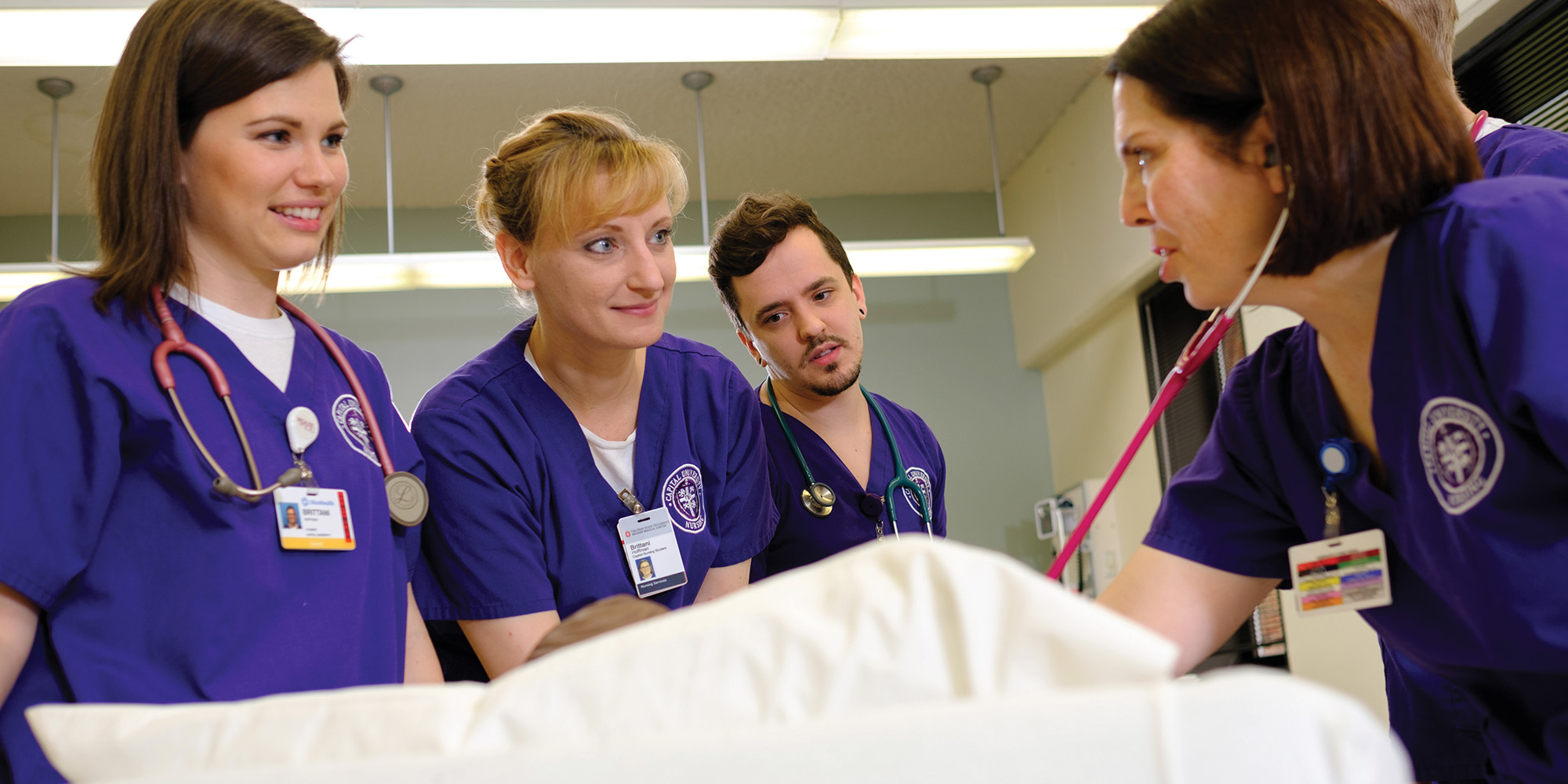 Group Of Nurses In Clinical Training