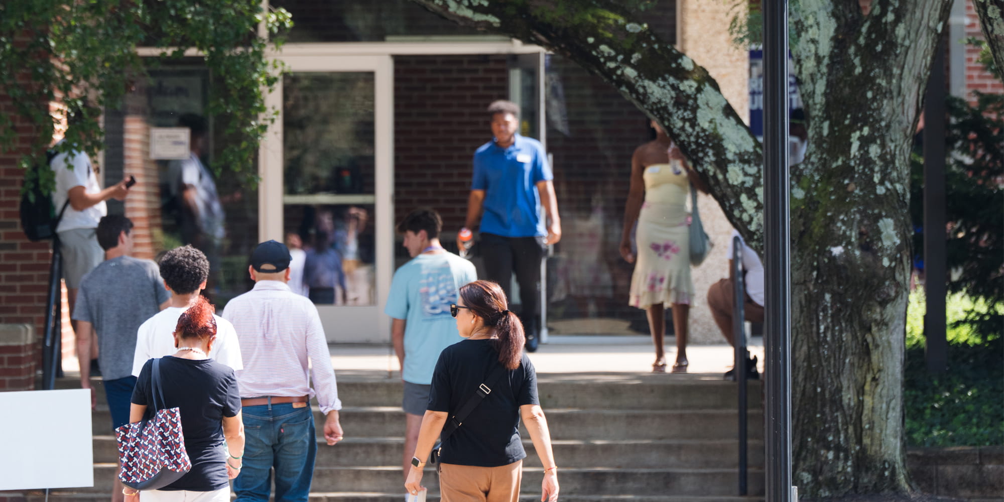 People Walking Towards Su