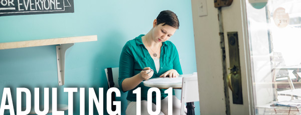 women filling out an application at a desk